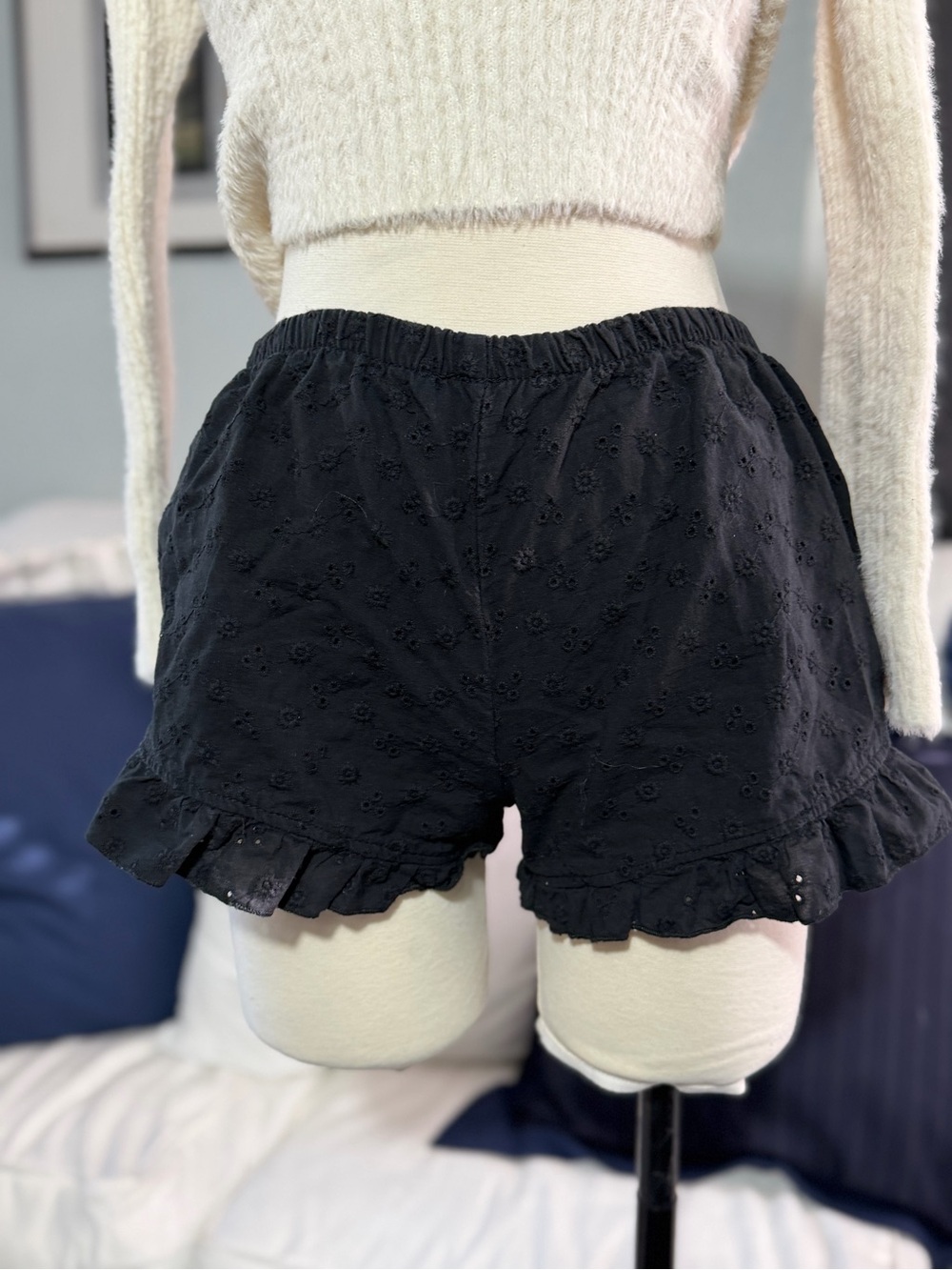 Black Eyelet Ruffle Hem Shorts